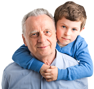 A young boy wraps his arms around his grandfather